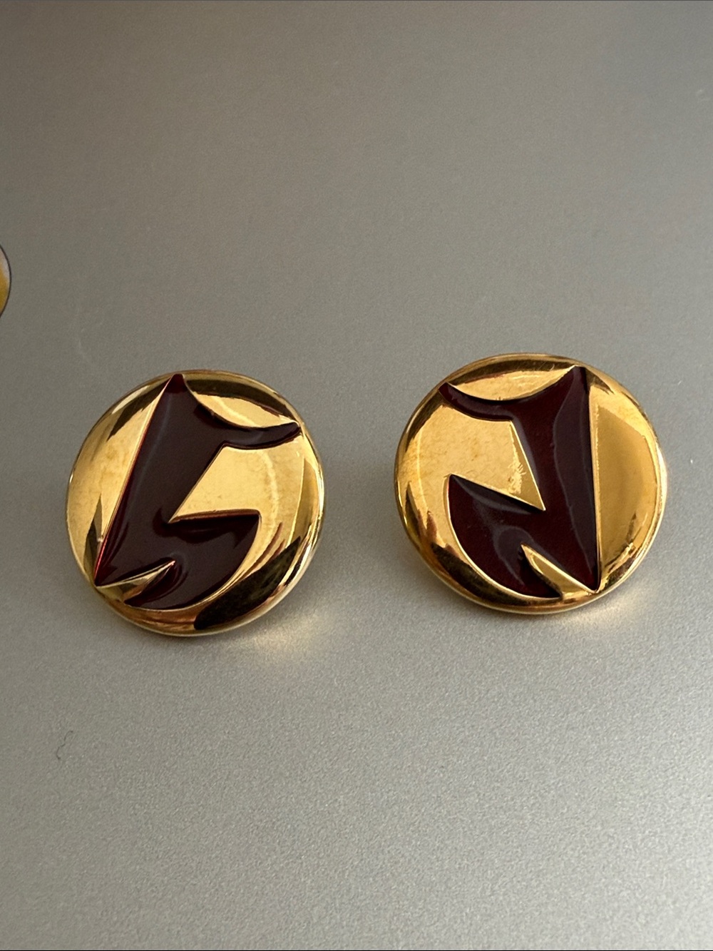 Vintage Monet Gold Tone Earrings with Deep Burgundy Enamel Accents